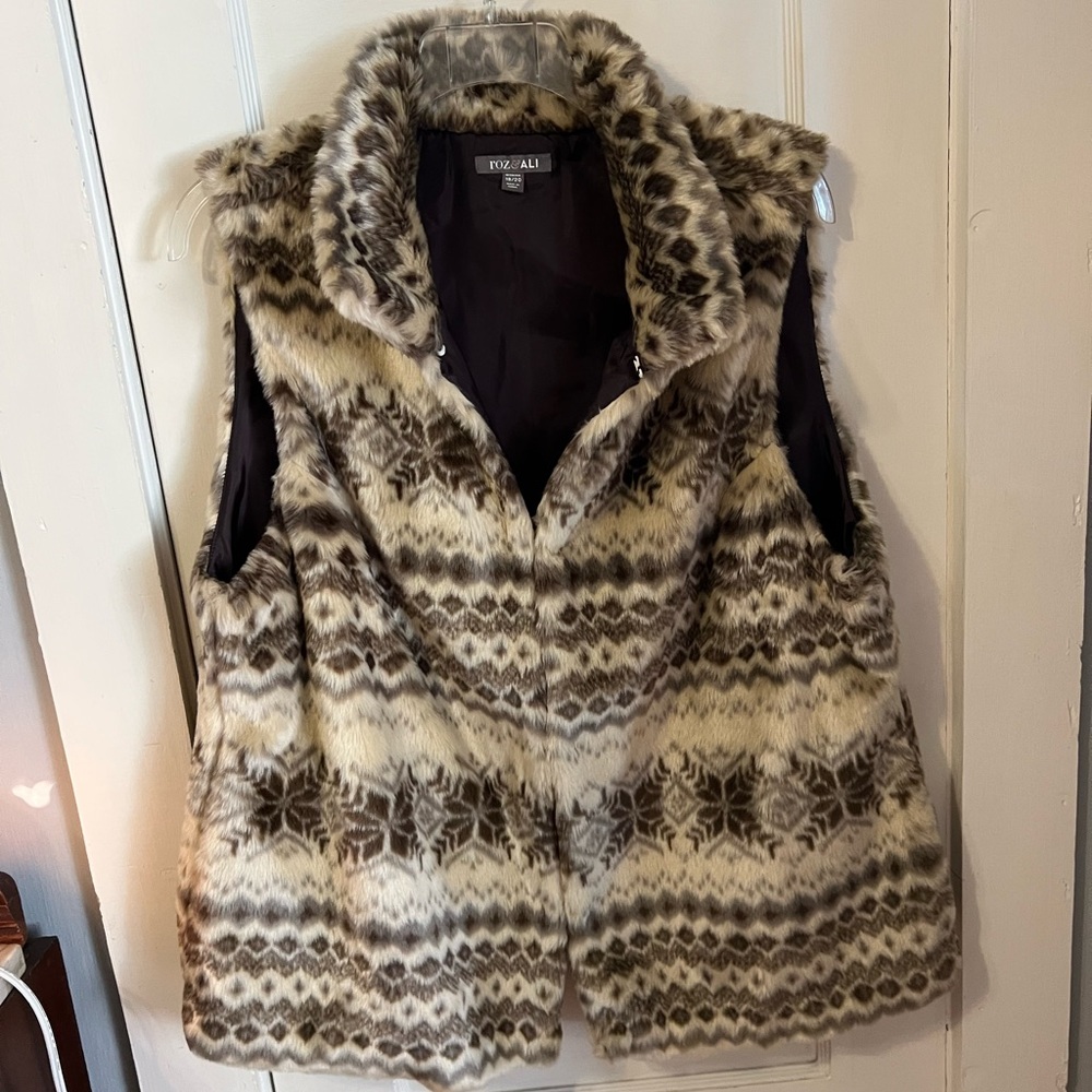 Aztec style faux fur vest.